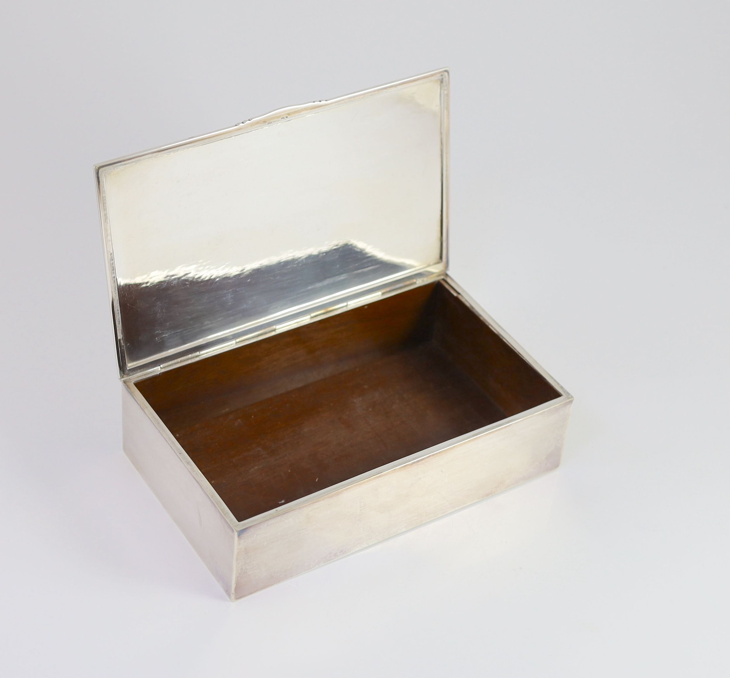 A 1930's planished silver rectangular cigarette box, by Georg Jensen, import marks, for London, 1938